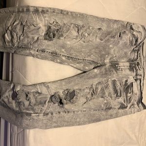 Grey and white jeans ripped style